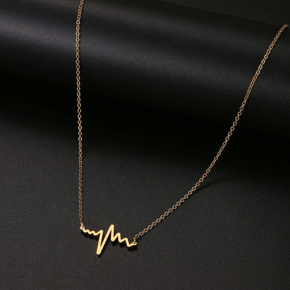 Gold Titanium Heartbeat Pendant Necklace - Premium Jewelry from Dazzling Delights - Just $22.95! Shop now at Dazzling Delights