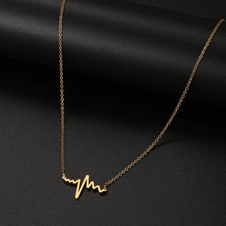 Gold Titanium Heartbeat Pendant Necklace - Premium Jewelry from Dazzling Delights - Just $13.12! Shop now at Dazzling Delights