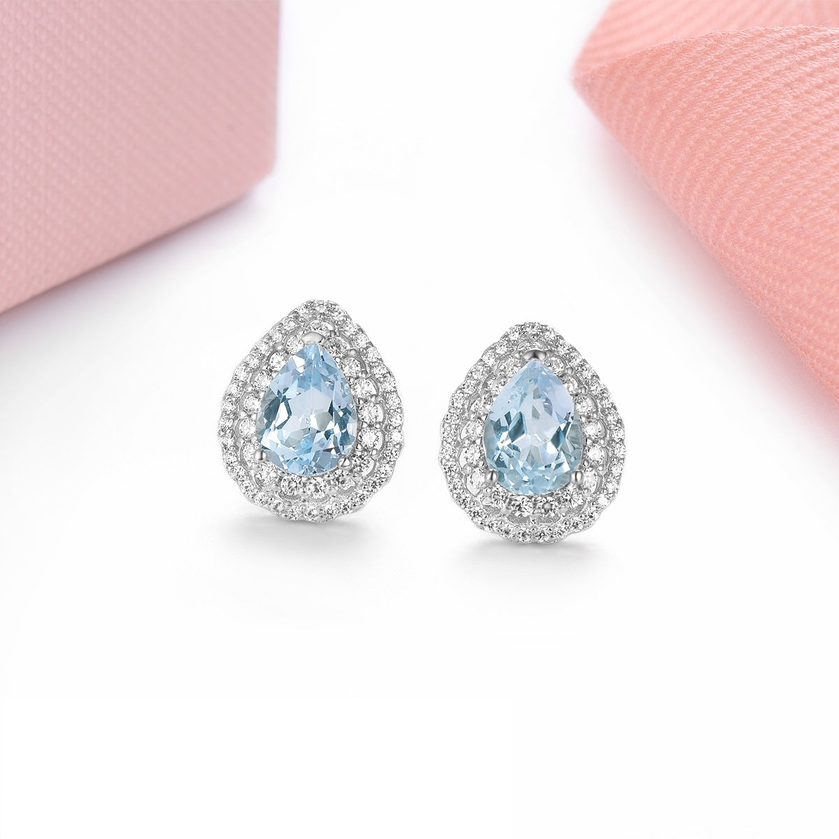 8x6mm Pear Cut Natural Blue Topaz Double Halo Stud Earrings - Premium Jewelry from Dazzling Delights - Just $85.95! Shop now at Dazzling Delights