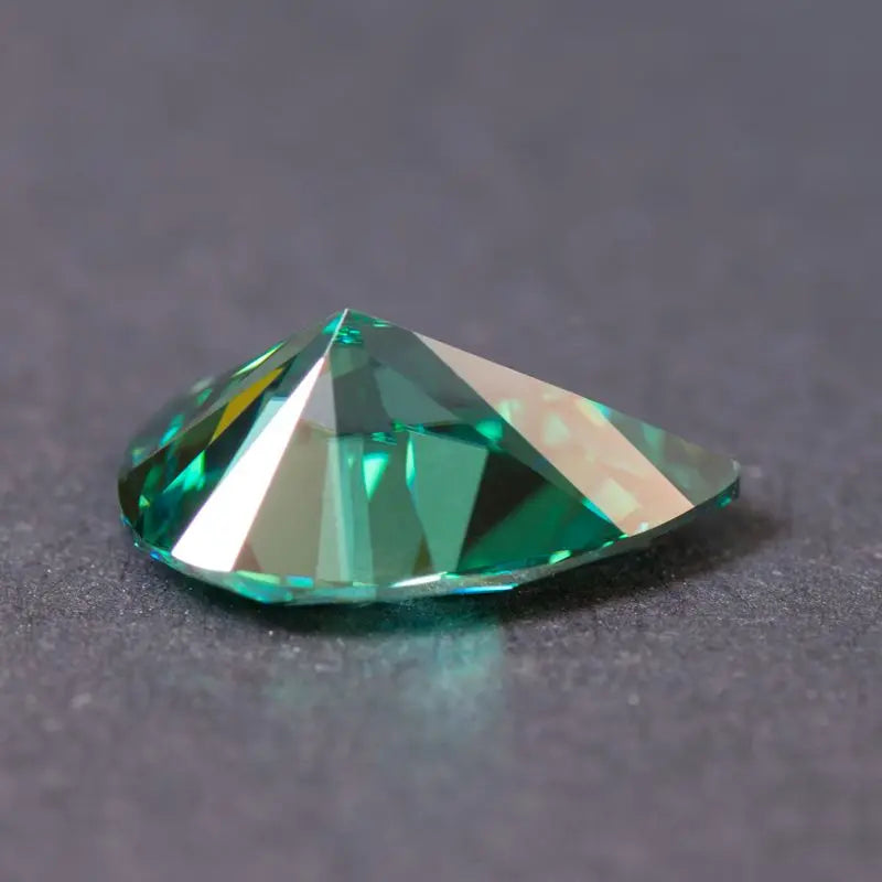 Emerald Green Pear Cut Moissanites - Premium Jewelry from Dazzling Delights - Just $83.33! Shop now at Dazzling Delights