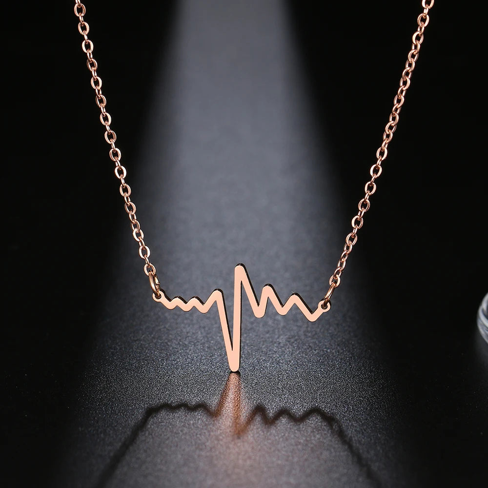 Gold Titanium Heartbeat Pendant Necklace - Premium Jewelry from Dazzling Delights - Just $22.95! Shop now at Dazzling Delights