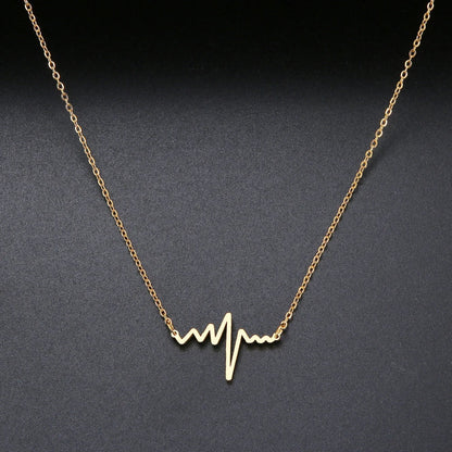 Gold Titanium Heartbeat Pendant Necklace - Premium Jewelry from Dazzling Delights - Just $22.95! Shop now at Dazzling Delights