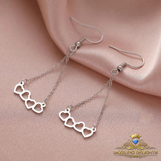 Titanium Four Hearts Dangle Earrings - Premium Jewelry from Dazzling Delights - Just $28.95! Shop now at Dazzling Delights