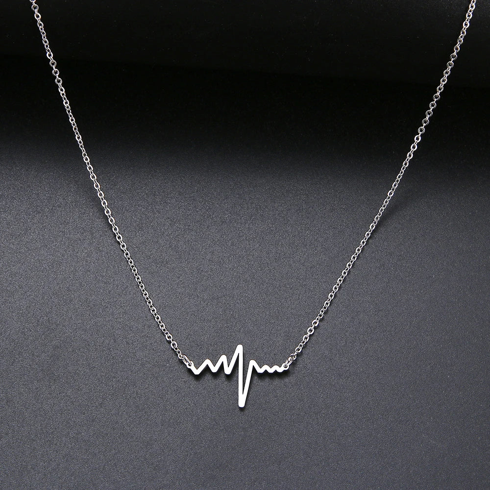 Gold Titanium Heartbeat Pendant Necklace - Premium Jewelry from Dazzling Delights - Just $22.95! Shop now at Dazzling Delights