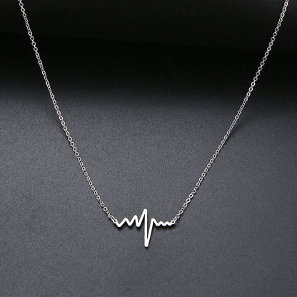 Gold Titanium Heartbeat Pendant Necklace - Premium Jewelry from Dazzling Delights - Just $22.95! Shop now at Dazzling Delights