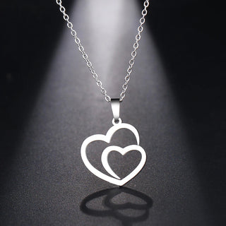 Gold Titanium Double Heart Pendant Necklace - Premium Jewelry from Dazzling Delights - Just $16.88! Shop now at Dazzling Delights