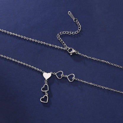 Titanium Five Heart Pendant Necklace - Premium Jewelry from Dazzling Delights - Just $20.96! Shop now at Dazzling Delights