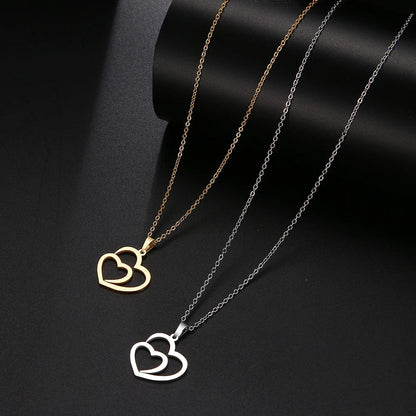 Gold Titanium Double Heart Pendant Necklace - Premium Jewelry from Dazzling Delights - Just $21.71! Shop now at Dazzling Delights