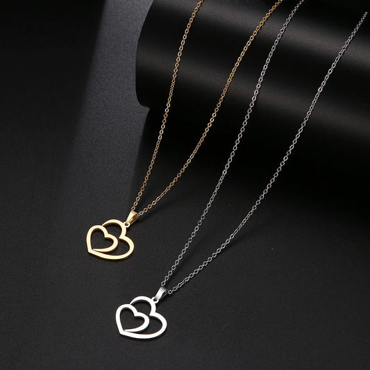 Gold Titanium Double Heart Pendant Necklace - Premium Jewelry from Dazzling Delights - Just $21.71! Shop now at Dazzling Delights