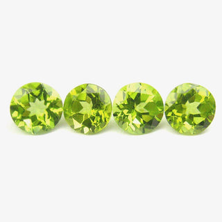 2 Pointer Round Brilliant Cut Peridots - Premium Jewelry from Dazzling Delights - Just $0.09! Shop now at Dazzling Delights