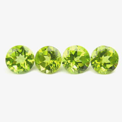 2 Pointer Round Brilliant Cut Peridots - Premium Jewelry from Dazzling Delights - Just $1.46! Shop now at Dazzling Delights