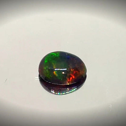 0.205ct Oval Cabochon Black Opal - Premium Jewelry from Dazzling Delights - Just $17.21! Shop now at Dazzling Delights