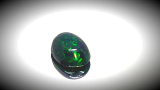 0.60ct Oval Cabochon Black Opal - Premium Jewelry from Dazzling Delights - Just $51.95! Shop now at Dazzling Delights