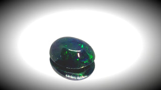 0.60ct Oval Cabochon Black Opal - Premium Jewelry from Dazzling Delights - Just $51.95! Shop now at Dazzling Delights