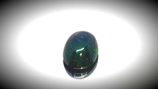 0.60ct Oval Cabochon Black Opal - Premium Jewelry from Dazzling Delights - Just $51.95! Shop now at Dazzling Delights