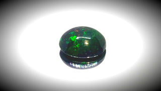 0.60ct Oval Cabochon Black Opal - Premium Jewelry from Dazzling Delights - Just $51.95! Shop now at Dazzling Delights