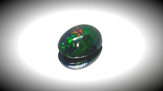 0.60ct Oval Cabochon Black Opal - Premium Jewelry from Dazzling Delights - Just $51.95! Shop now at Dazzling Delights