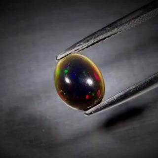 0.95ct Oval Cabochon Black Opal - Premium Jewelry from Dazzling Delights - Just $31.88! Shop now at Dazzling Delights