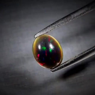 0.95ct Oval Cabochon Black Opal - Premium Jewelry from Dazzling Delights - Just $31.88! Shop now at Dazzling Delights