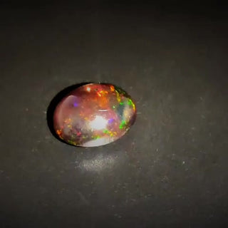 1.28ct Oval Cabochon Vivid Play of Colour Ethiopian Black Opal - Premium Jewelry from Dazzling Delights - Just $56.25! Shop now at Dazzling Delights