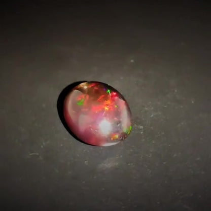 1.28ct Oval Cabochon Vivid Play of Colour Ethiopian Black Opal - Premium Jewelry from Dazzling Delights - Just $92.95! Shop now at Dazzling Delights