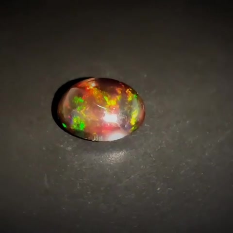 1.28ct Oval Cabochon Vivid Play of Colour Ethiopian Black Opal - Premium Jewelry from Dazzling Delights - Just $69.71! Shop now at Dazzling Delights