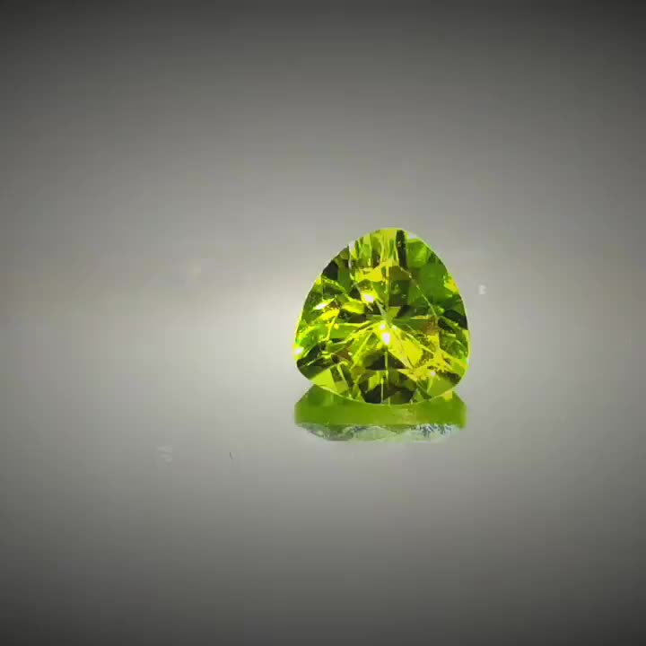 1.49ct Trillion Cut Peridot - Premium Jewelry from Dazzling Delights - Just $21.71! Shop now at Dazzling Delights