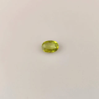 1.04ct Oval Cut Yellowish Green Sphene with Rainbow Fire - Premium Jewelry from Dazzling Delights - Just $18.75! Shop now at Dazzling Delights