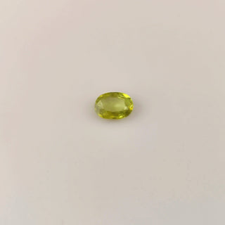 1.04ct Oval Cut Yellowish Green Sphene with Rainbow Fire - Premium Jewelry from Dazzling Delights - Just $31.95! Shop now at Dazzling Delights