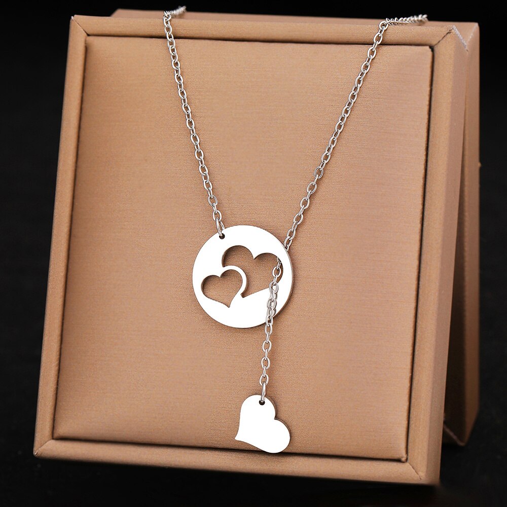 Silver Titanium Hollow and Solid Hearts Pendant Necklace - Premium Jewelry from Dazzling Delights - Just $17.21! Shop now at Dazzling Delights