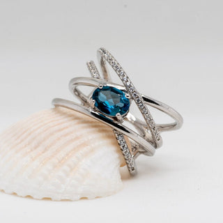 "The Atomic Topaz" London Blue Topaz Crossed Band Ring - Premium Jewelry from Dazzling Delights - Just $92.95! Shop now at Dazzling Delights