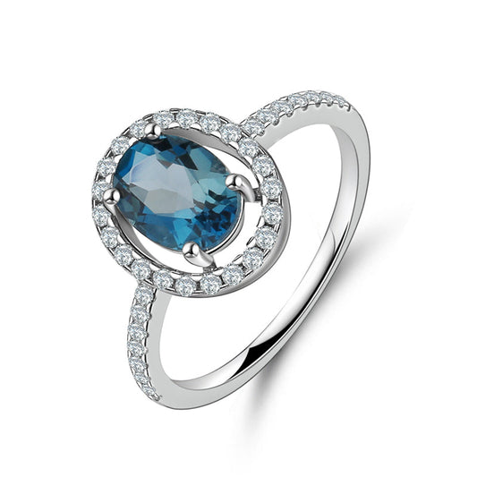 "The Eye of London" 8x6mm Oval Cut Natural London Blue Topaz Halo Ring - Premium Jewelry from Dazzling Delights - Just $82.46! Shop now at Dazzling Delights