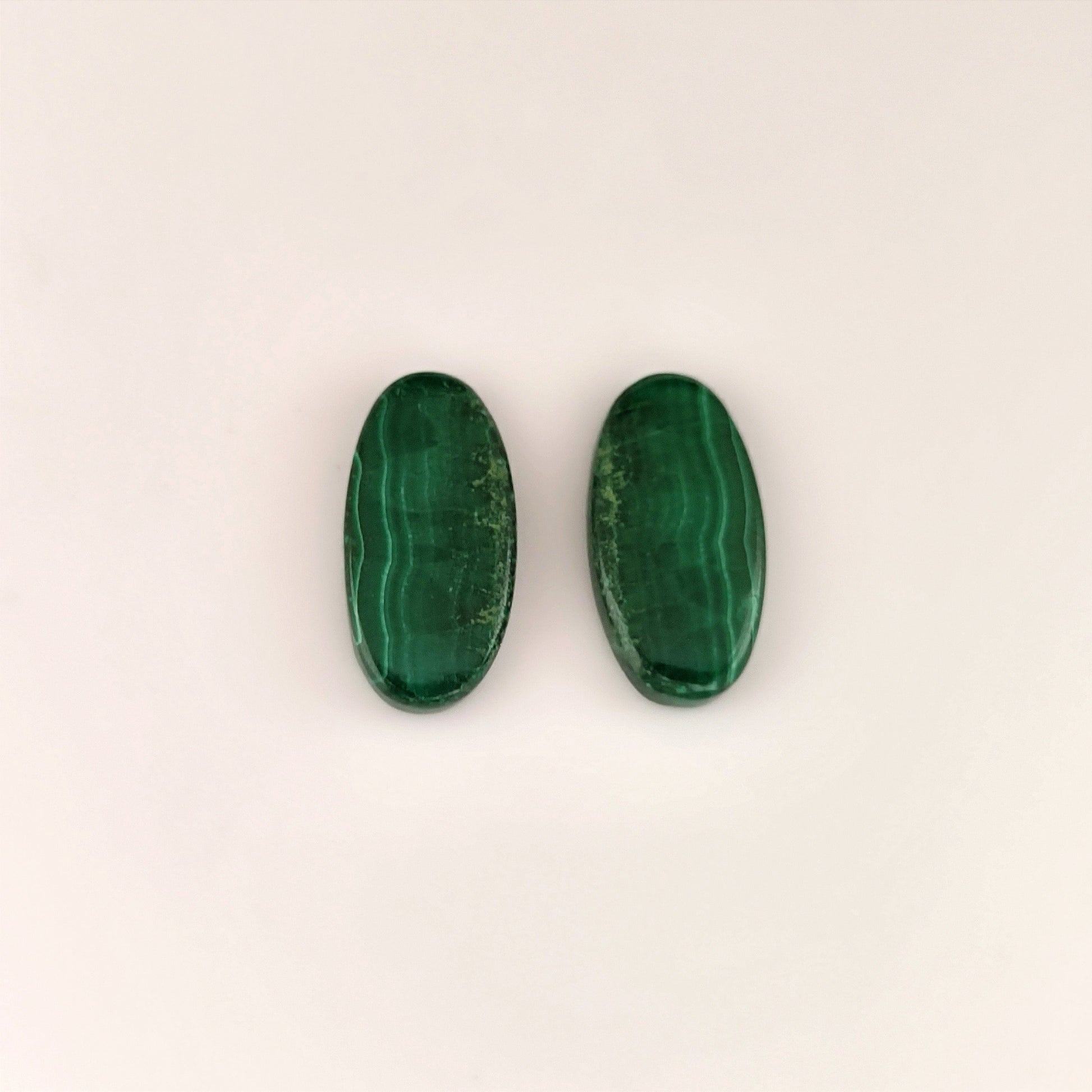 23.62ct Oval Cabochon Malachite Pair - Premium Jewelry from Dazzling Delights - Just $8.21! Shop now at Dazzling Delights