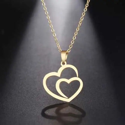 Gold Titanium Double Heart Pendant Necklace - Premium Jewelry from Dazzling Delights - Just $21.71! Shop now at Dazzling Delights