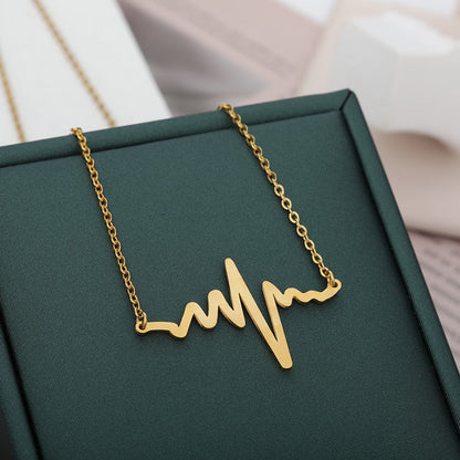 Gold Titanium Heartbeat Pendant Necklace - Premium Jewelry from Dazzling Delights - Just $22.95! Shop now at Dazzling Delights