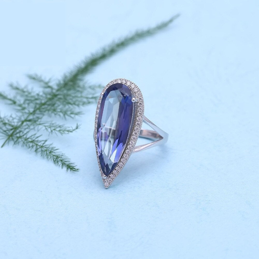 "The Oceanic Tear" 11.5ct Pear Cut Iolite Blue Mystic Quartz Halo Ring - Premium Jewelry from Dazzling Delights - Just $75.71! Shop now at Dazzling Delights