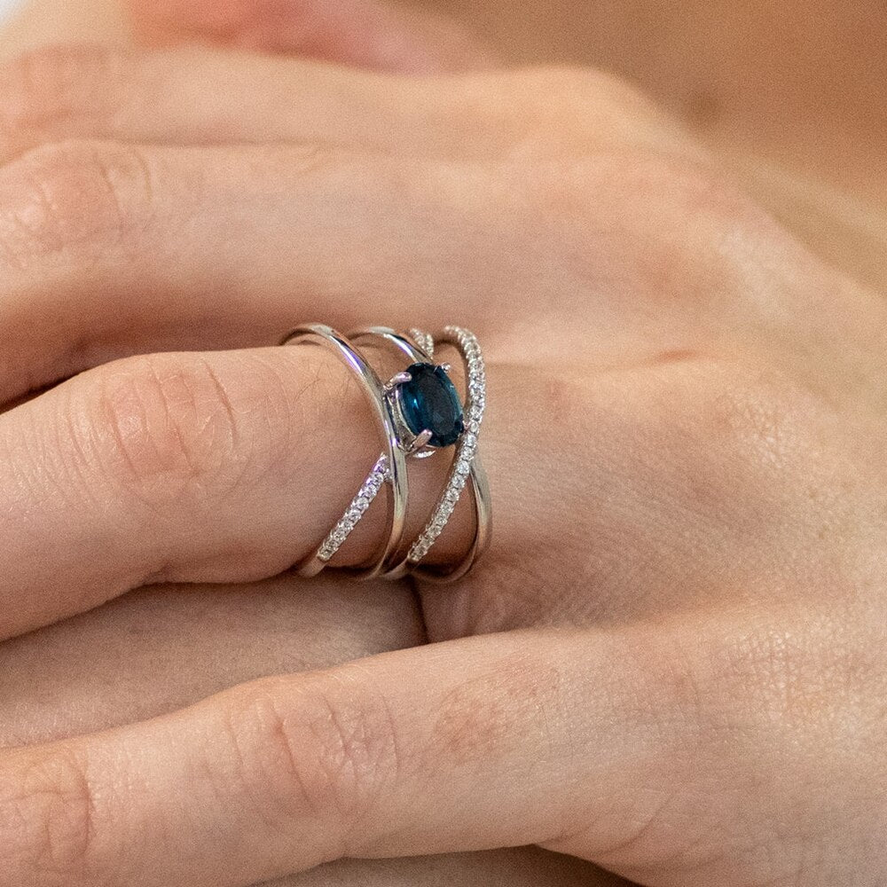 "The Atomic Topaz" London Blue Topaz Crossed Band Ring - Premium Jewelry from Dazzling Delights - Just $69.71! Shop now at Dazzling Delights