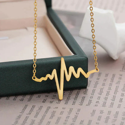 Gold Titanium Heartbeat Pendant Necklace - Premium Jewelry from Dazzling Delights - Just $22.95! Shop now at Dazzling Delights