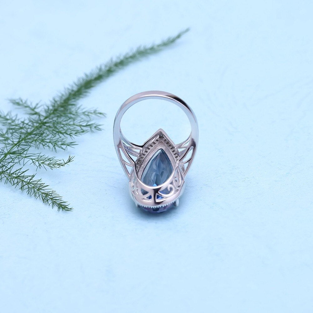 "The Oceanic Tear" 11.5ct Pear Cut Iolite Blue Mystic Quartz Halo Ring - Premium Jewelry from Dazzling Delights - Just $75.71! Shop now at Dazzling Delights