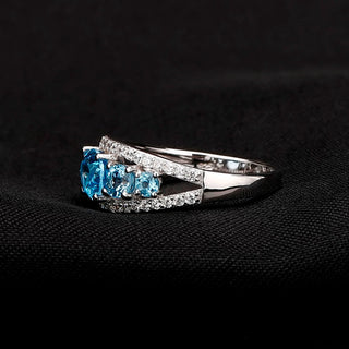 "The Heavenly Quintet" Natural Oval and Round Cut Sky Blue Topaz Ring - Premium Jewelry from Dazzling Delights - Just $65.25! Shop now at Dazzling Delights