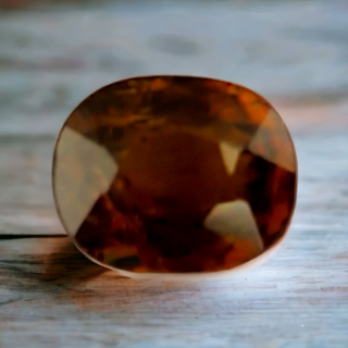 2.14ct Oval Cut Cognac Reddish Brown Sphene with Rainbow Fire - Premium Jewelry from Dazzling Delights - Just $45! Shop now at Dazzling Delights